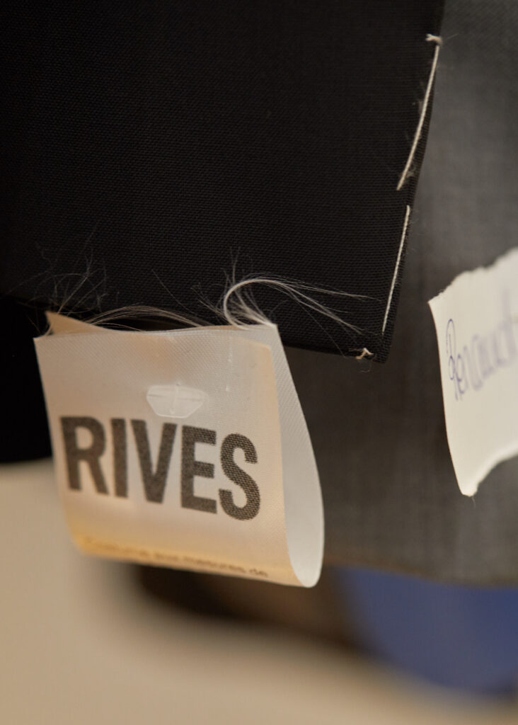 RIVES label on black fabric